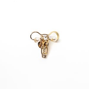 Pin Útero dorado