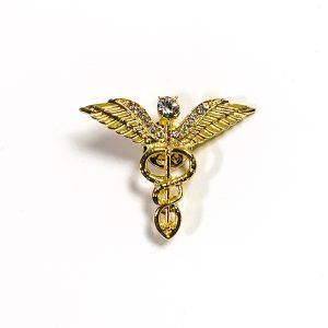 Pin Símbolo Salud Dorado