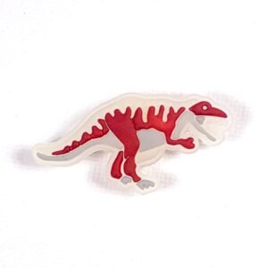 Pin tipo Crocs Glowing Dinosaurio | Tiranosaurio Rex Café